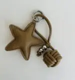 LLAVERO O CHARM ESTRELLA - OVILLO
